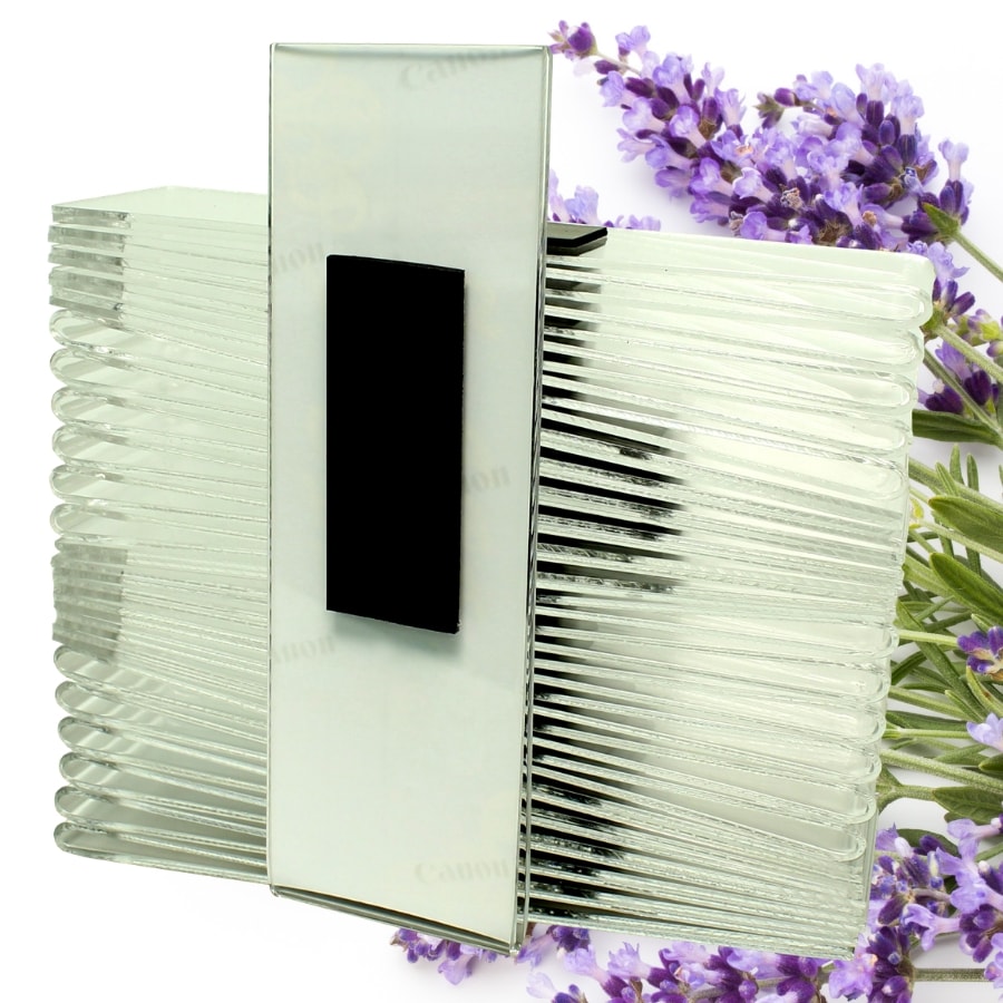 Back side of acrylic photo booth frame showing the strong magnet attached for refrigerators