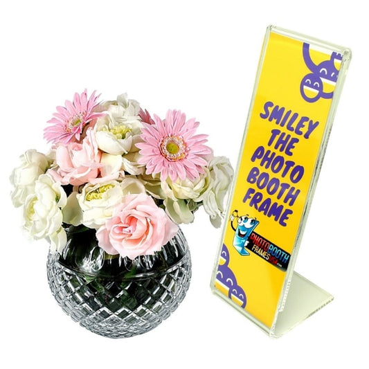 Slanted acrylic frame made from extra thick acrylic to hold photo booth pictures or inserts